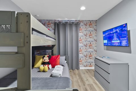 Mickey's Family Bunk Retreat: Playful Decor and Comfort for All!