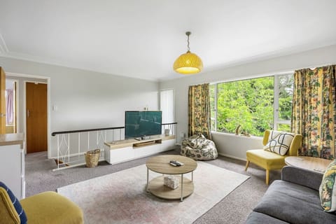 Large windows let the natural light flood the room.