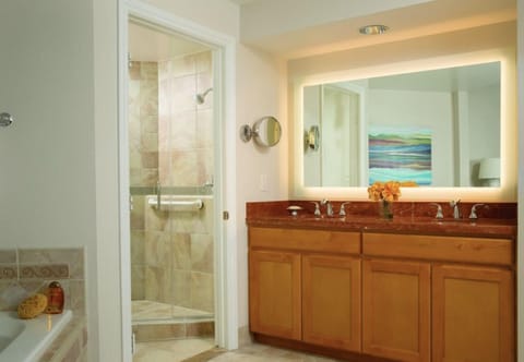 sample bathroom with separate shower and oversized tub