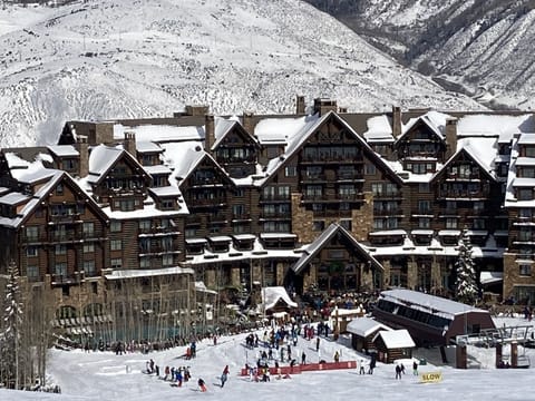 Hotel “backyard” with pools, hot tubs, fire pits, bars, music and dining
