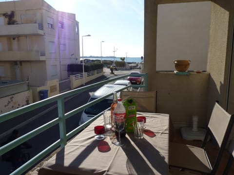 furnished terrace with a beautiful side view of the sea