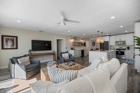 Laptop friendly kitchen bar so you can work and socialize with ease