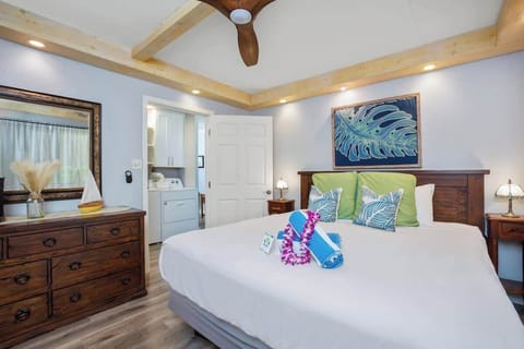 Have a restful night's sleep in your bedroom with a king-size bed, and a ceiling fan.