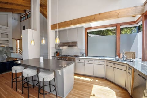 For dining, the kitchen is furnished with inside and outside dinnerware for 16.