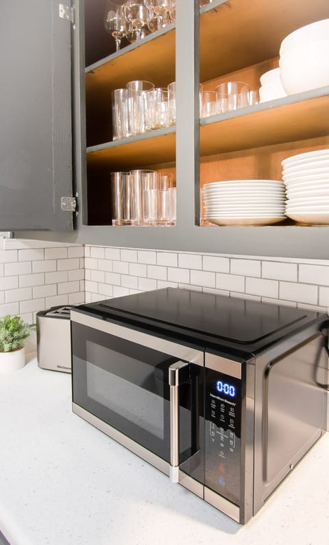 Glasses, plastic drink ware, wine glasses, and dishes.