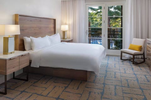 Primary Bedroom features a king bed and ensuite bath.