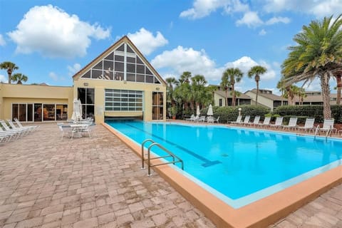 Clubhouse indoor/outdoor, heated pool: 1 minute walk from the back lanai!