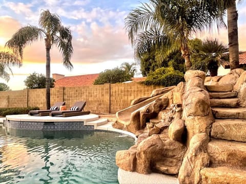 Relax on lounger or enjoy the waterslide!