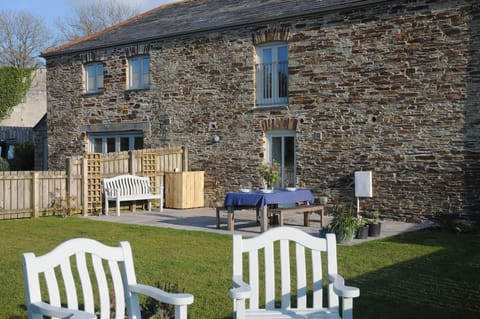 The large enclosed rear garden is perfect for al fresco dining.