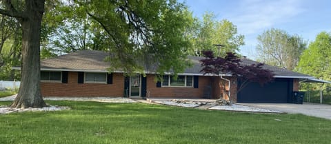 Ranch style home with 3 bedrooms 5 beds 2 baths 2 car garage plus carport