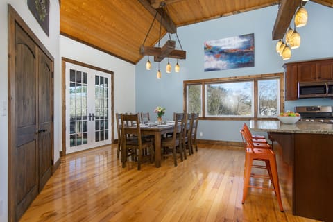 Large dining area and open kitchen for you and your guests.