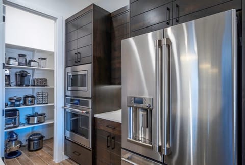 Ample kitchen supply provided with extra kitchen appliances - makes for easy cooking with large groups!
