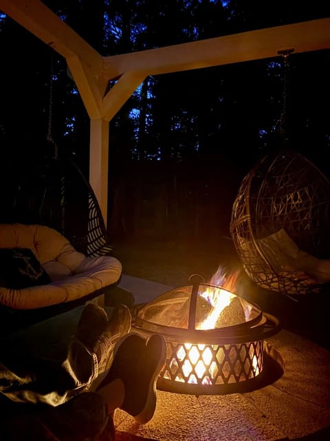 The Ember Arbor is a one-of-a-kind outdoor gathering space just steps from Gold Run Creek, perfect for evening fires and making memories together.