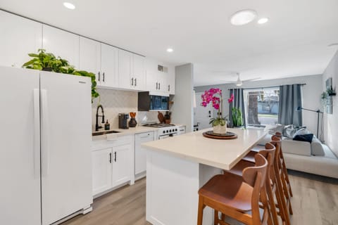 Enjoy cooking and dining style with a full stocked kitchen with new appliances.