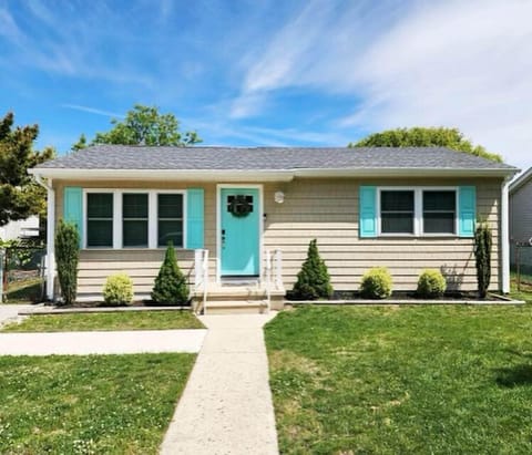 New siding, windows and shutters for a beachy vibe 