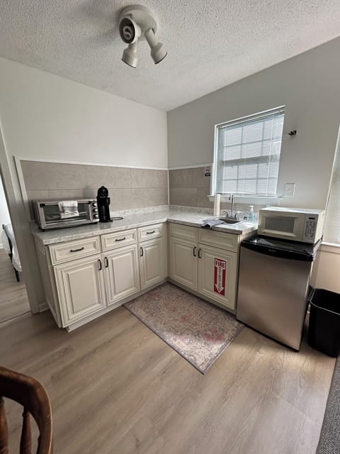 Kitchenette - Sink, pod style coffee maker, toaster oven (no oven or stove)