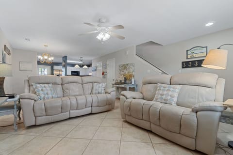 Cozy living room with plush seating, perfect for relaxing evenings.