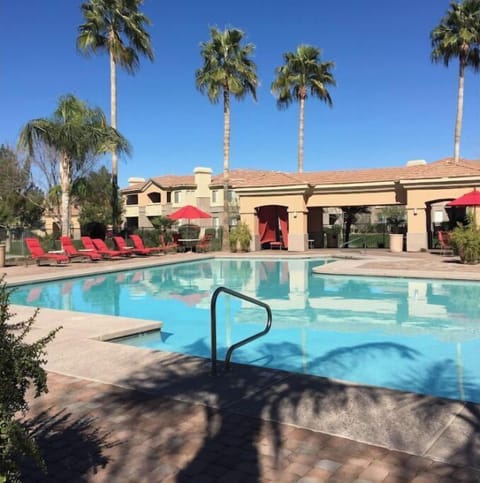Clubhouse pool heated lounge chairs and Jacuzzi 