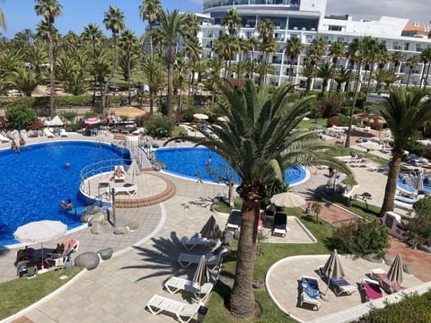 Altamira has three pools one heated