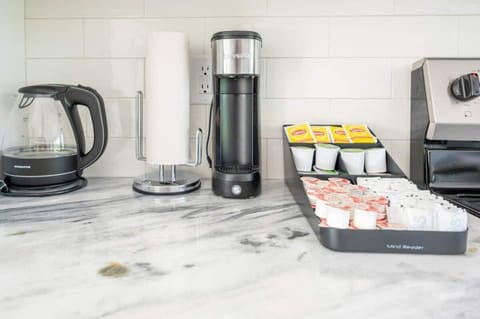 Fully stocked coffee and tea station.