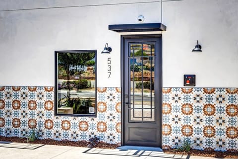 A warm welcome awaits you at our charming entrance!