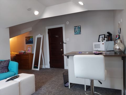 Mini kitchenette bar and work station.