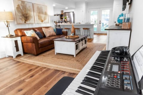 Keyboard piano in the living room — have fun playing or teaching the kids a new tune.