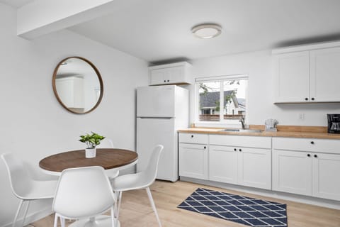 Enjoy a nice meal in the kitchenette area equipped with a mini-fridge, coffee maker, and microwave.