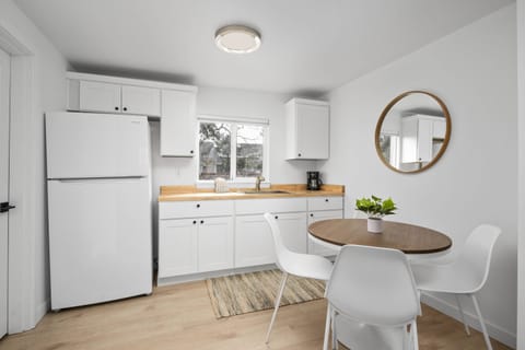 Enjoy a nice meal in the kitchenette area equipped with a mini-fridge, coffee maker, and microwave.