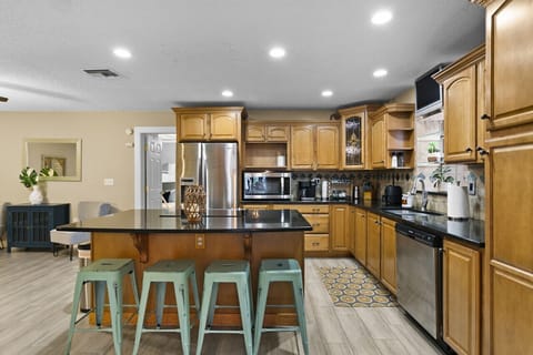 Breakfast at the kitchen island, then head out to the pool!