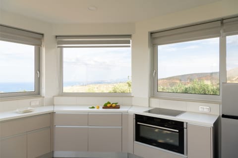 Fully equipped outdoor kitchen next to the outdoor dining area.