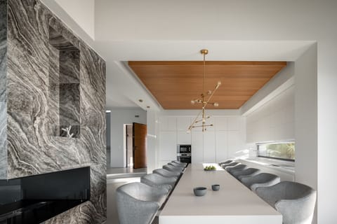 Indoor dining table for 14 guests, adjacent to the kitchen!