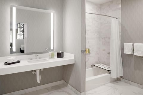 Refresh at a bright vanity with spa-like towels and finishes.