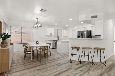 Beautiful kitchen chairs and furnishings add to the styled spaces throughout.