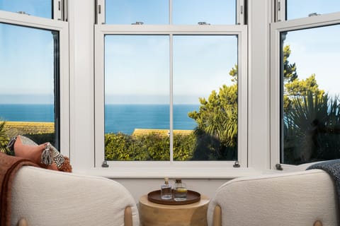 King bedroom with stunning sea and beach views