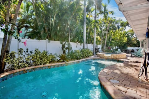 Heated pool with in-ground spa