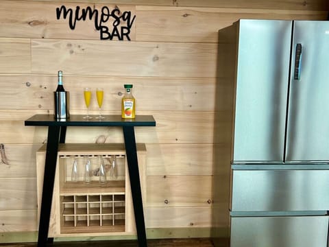 Prepare your favorite drink on the mimosa bar with reusable champagne glasses.