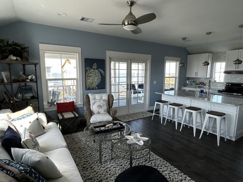 Relax at the counter or in the seating area across from open kitchen.