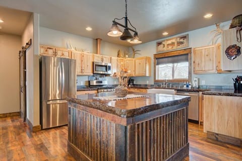 This oversized counter with concrete countertops make this kitchen a cooks dream!
