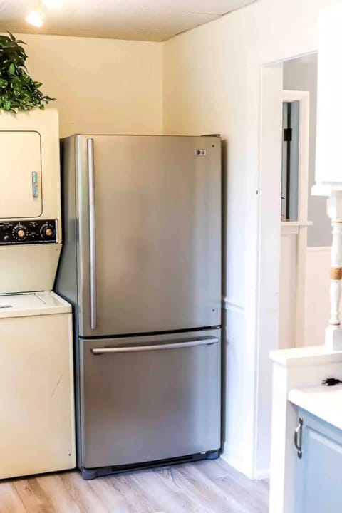 stainless steel fridge and washer/dryer