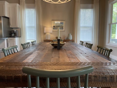 Handmade dining table from reclaimed wood.  Seating for 8 + 4 at the island.