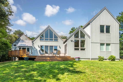 Back Exterior Has a Deck with Distant Views of Sengenkontacket Pond