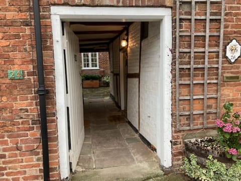 The front door is on the right hand side.