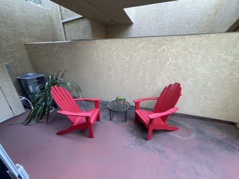 The outside relaxation area has two chairs