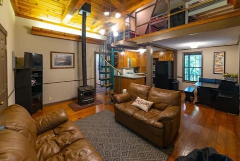 Sink into a comfy couch with a blanket and a good book.