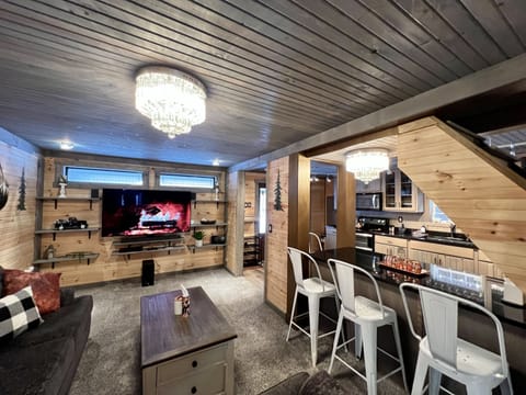 Bar seating open to Living room