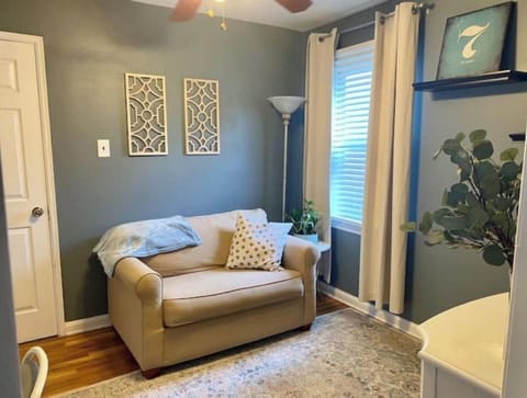 Bedroom 3: This chair is a twin size pull out sofa sleeper.