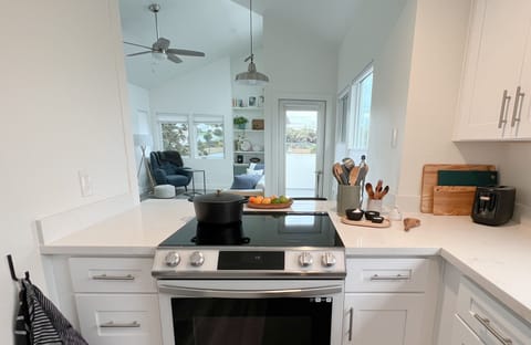 Kitchen with induction stove.