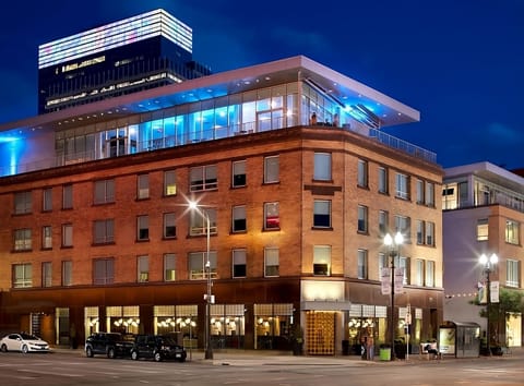 Arrive in style to a beautifully lit city landmark.