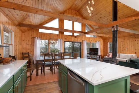 Open concept floor plan with cathedral ceilings